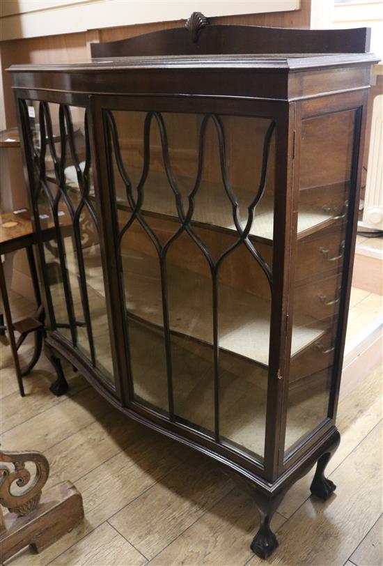 A mahogany serpentine display cabinet, W.107cm